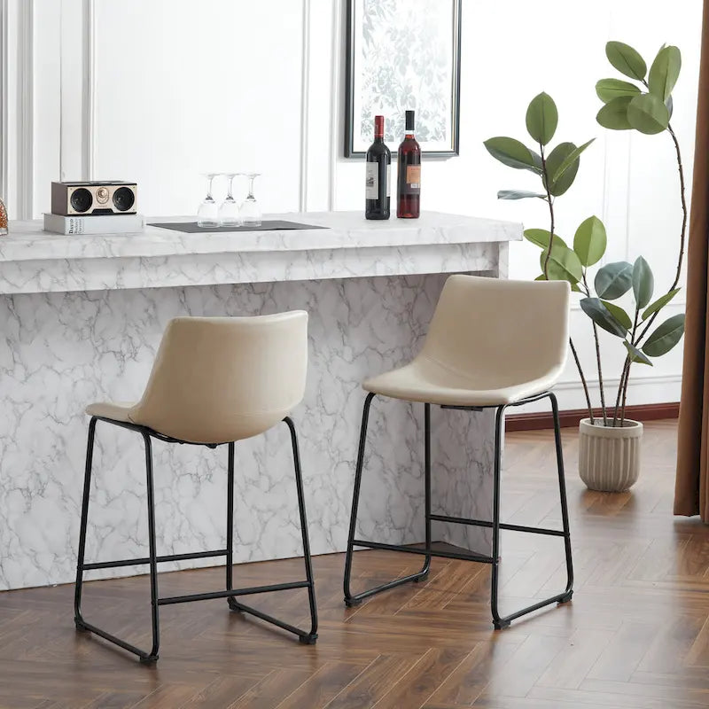 Tabourets de bar vintage en similicuir avec pieds et repose-pieds en métal, lot de 2