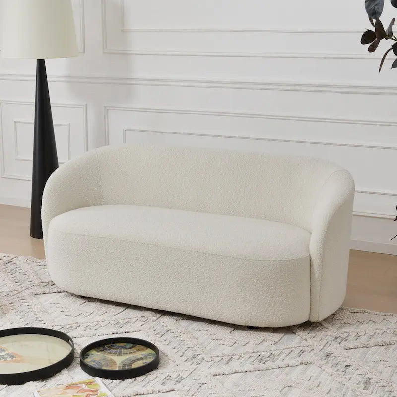 Causeuse rembourrée avec accoudoirs évasés et pieds réglables, 68"L