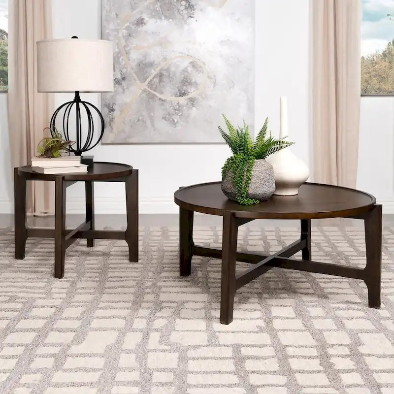 Table basse ronde marron foncé avec pieds croisés en X