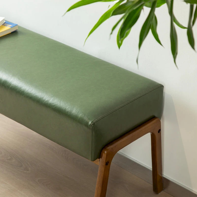 Banc moderne en similicuir avec pieds en bois d'hévéa noyer, L 107,3 cm